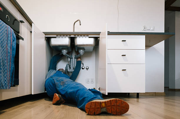 Professional Emergency Plumber technician working in Crisfield, MD